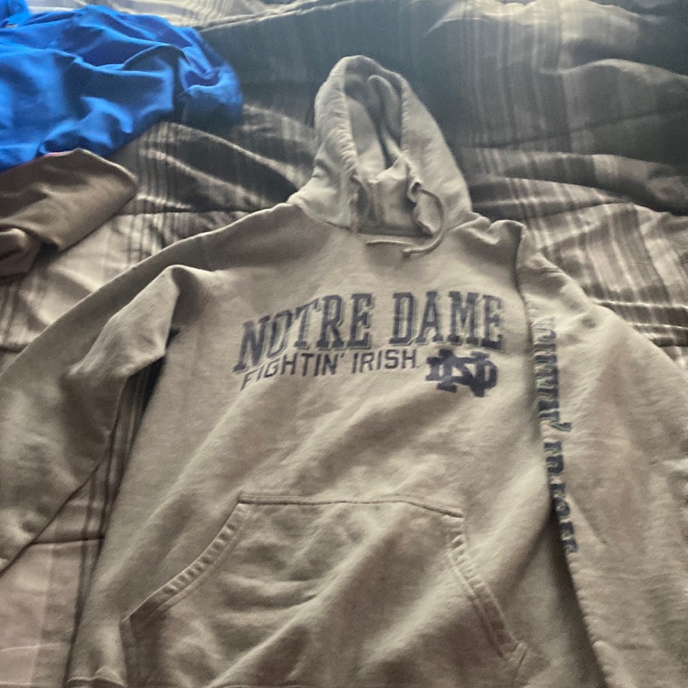 Notre Dame girls hoodie good shape but cut at the neck area. Size S